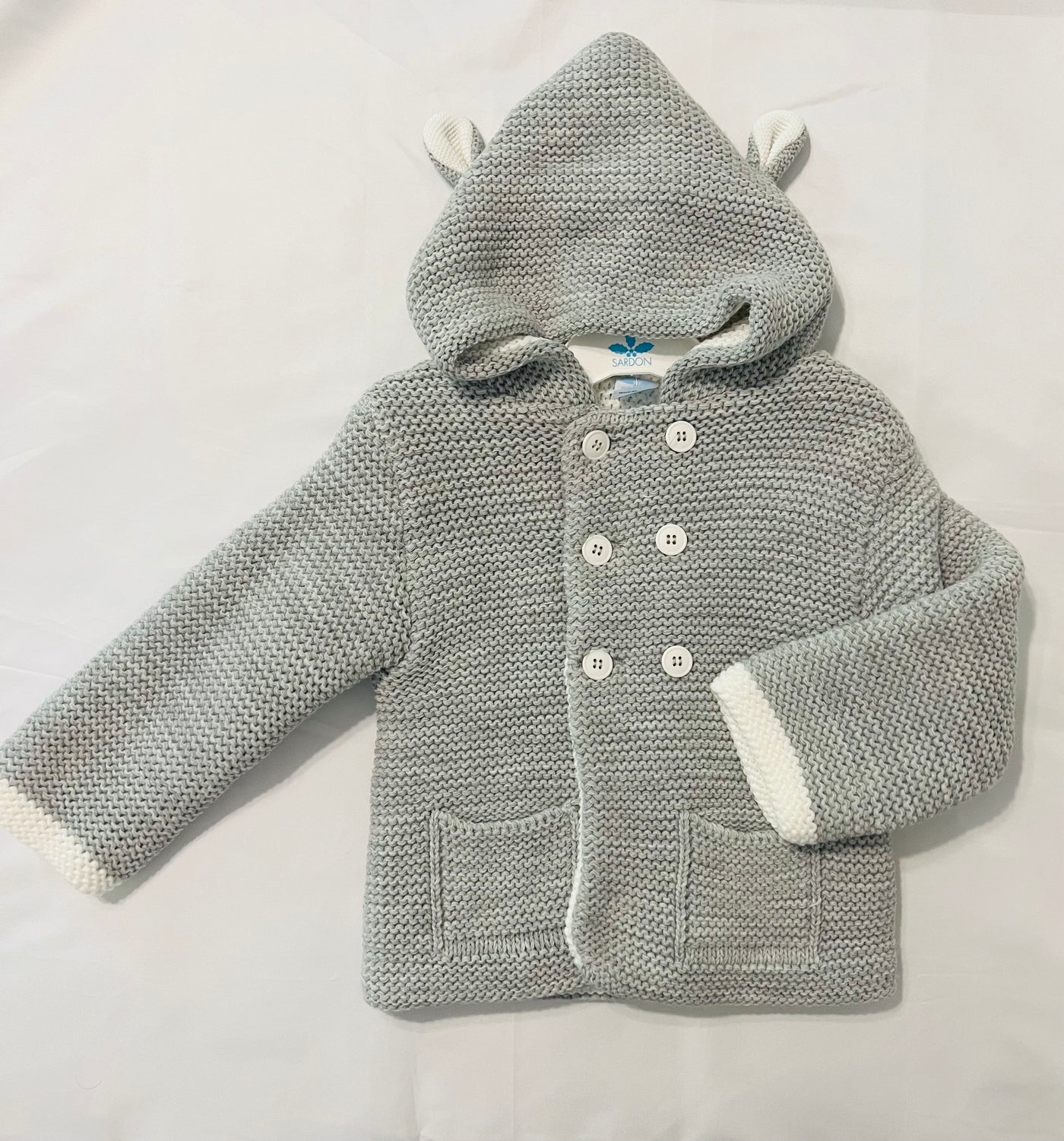 Gray knitted jacket with hoodie