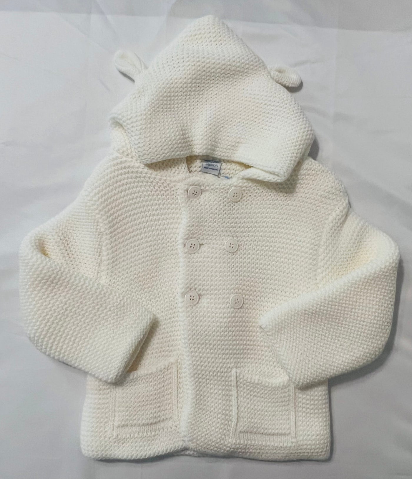 White knitted jacket with hoodie